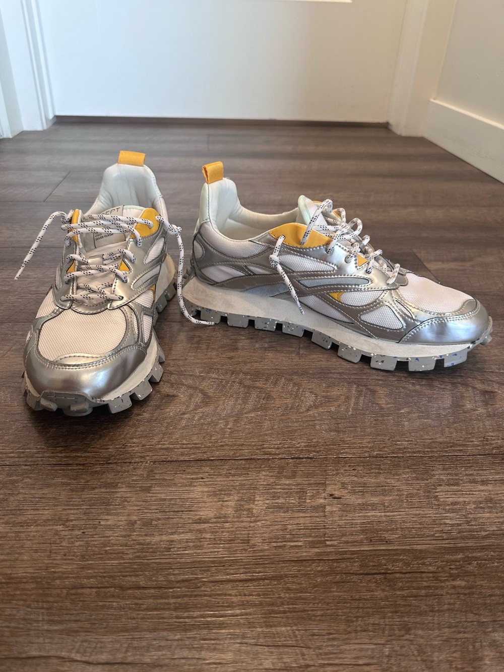 Women's Metallic Silver Sneakers with Yellow Accents